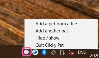 Clicky Pet's tray icon marked, with its menu: Add a pet from a file, Add another pet, Hide / show, Quit Clicky Pet